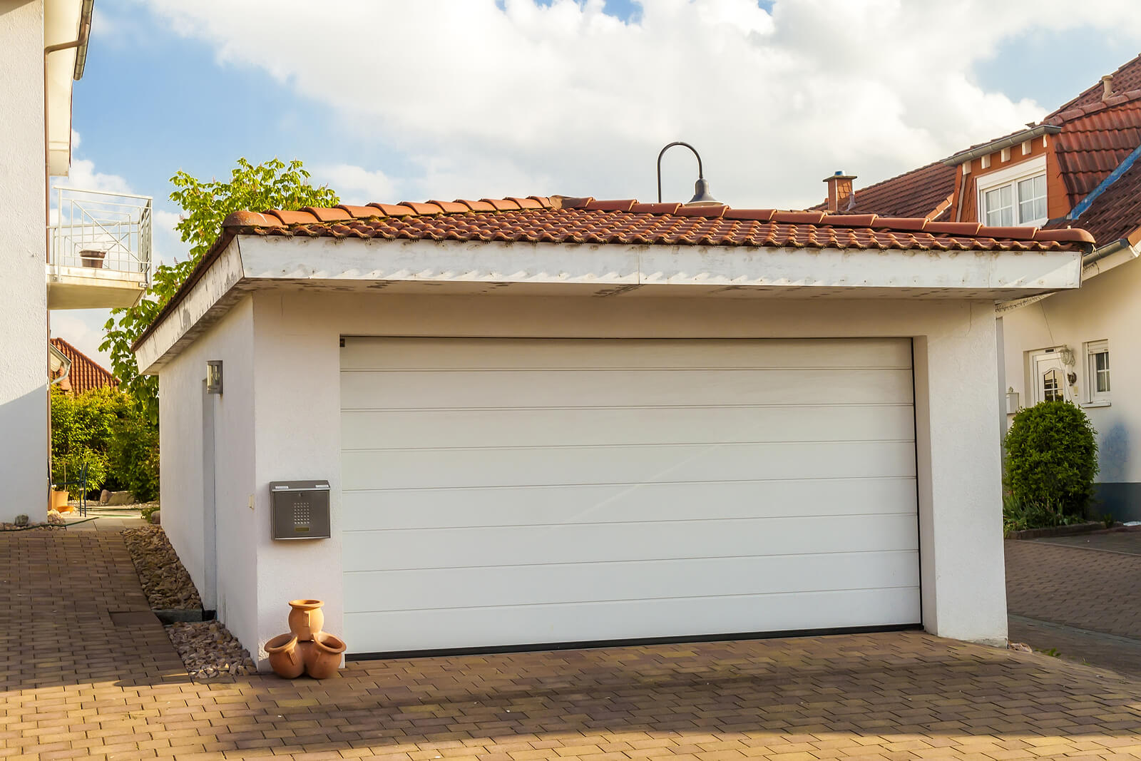 Detached-White-Garage-With-Tile-Roof