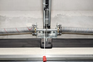 Compare torsion spring vs extension spring systems to learn how garage door springs work, their differences, benefits, safety, and maintenance needs.